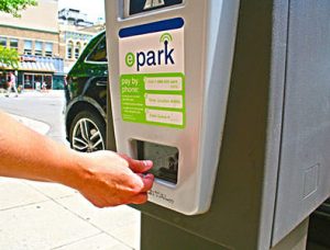 E Park Paying at Meter